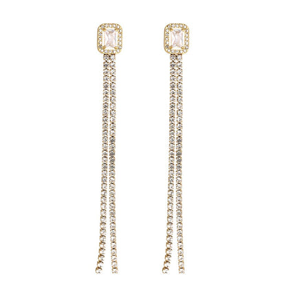 Pozlacené dlouhé náušnice s krystaly – Spotlight Queen
