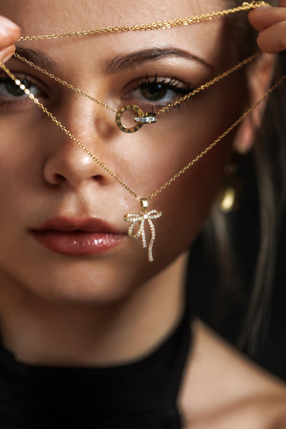 Náhrdelník Coquette s mašličkou, pozlacený